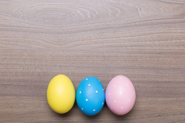 Easter eggs on wooden background