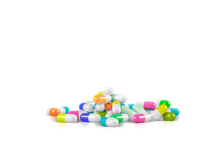 Different pharmaceutical medicine pills, tablets and capsules in different colors on white background. Health care concept. 3D render illustration.