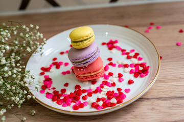 Macarons and sprinkles on Dessert Table. Shallow depth of field