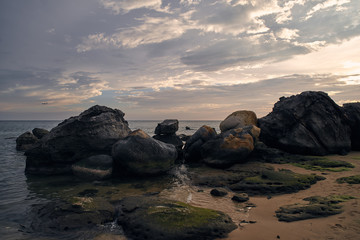 Fototapeta na wymiar sunset on coast of the sea