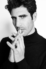 Good looking thoughtful guy in studio