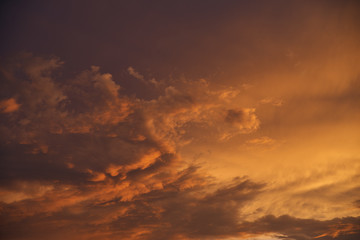 Naklejka na ściany i meble Beautiful sunset on the sea and sky with clouds.