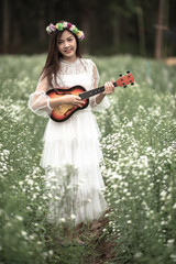 Beautiful girl playing music