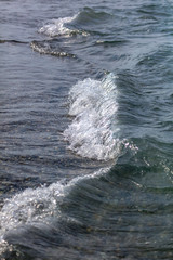 Waves on the seashore as an abstract background