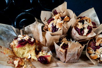 muffins on wooden board with dark background