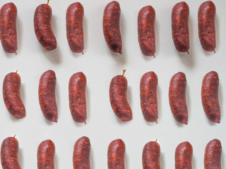 Spanish sausage pattern on white background