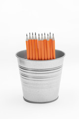 pencils on a white background in a bucket