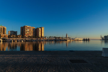 Fototapeta premium port pier one with colorful light skyline
