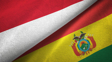 Fototapeta premium Indonesia and Bolivia two flags textile cloth, fabric texture