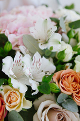 Bouquet with roses and lilies