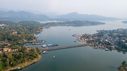 Auttamanusorn Wooden Bridge (Sapan Mon), Sungkaburi, Kanchanaburi, Thailand. Sangklaburi Sapan mon is most longer number two for wooden bridge in the world record.