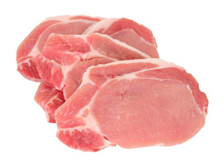 Group of fresh raw pork meat steaks isolated on a white background