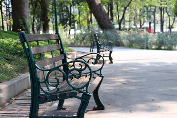 the Wooden Long bench in the park.