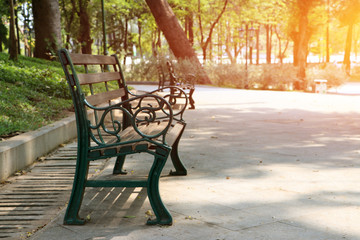 the Wooden Long bench in the park.