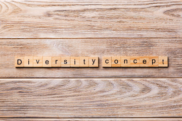 Diversity concept word written on wood block. Diversity concept text on wooden table for your desing