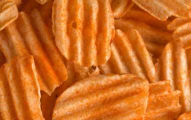 potato chips with herbs and pepper. background