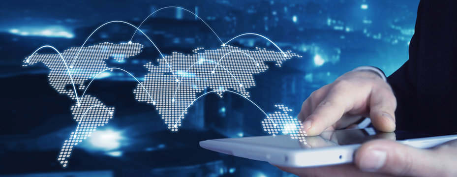 Man holding tablet with world map. Technology concept