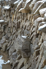 dry stone wallng coverd with snow