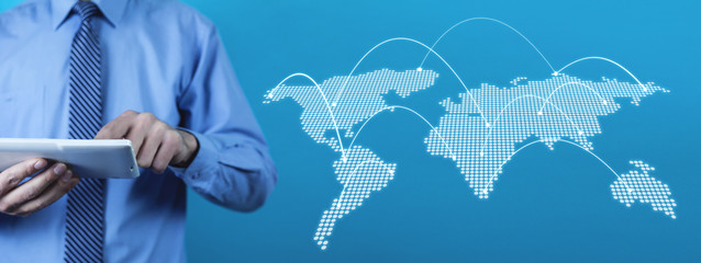 Man holding tablet with world map. Technology concept