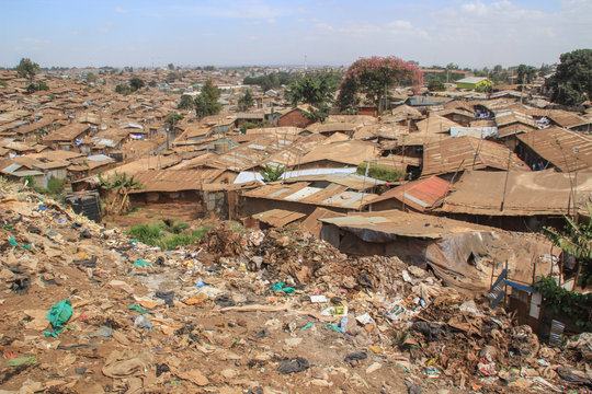 Kibera, Nairobi, Kenya - February 13, 2015: Huge heaps of garbage in the slums of Nairobi - one of the poorest places in Africa