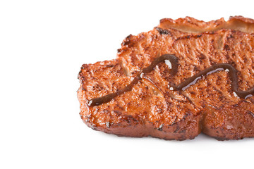 Beef steak on white background, close-up.