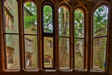 View trough medieval window to courtyard at Skipton Castle,North Yorkshire,Great Britain.