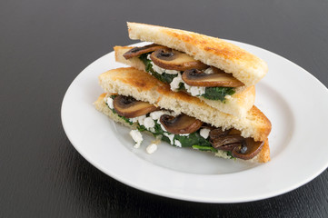 sandwich with spinach, cottage cheese and mushrooms.
