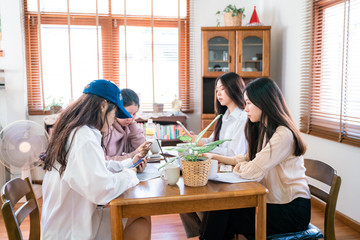 Group of business women with laptop discussing