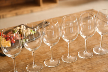 Empty wineglasses on wooden table