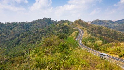 Road view with car on the mountain from above