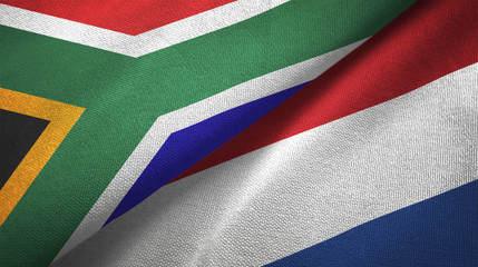 South Africa and Netherlands two flags textile cloth, fabric texture