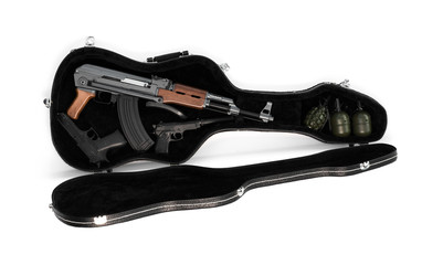 firearm weapon in a guitar case