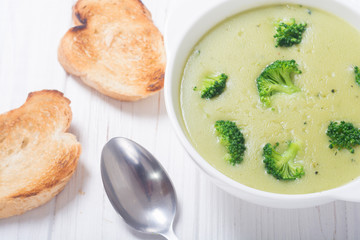 Fresh broccoli cream soup in bowl