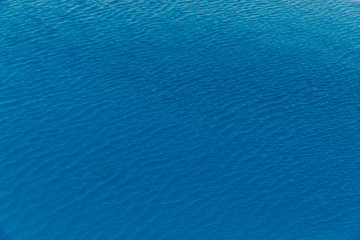 Obraz na płótnie Canvas Little waves on calm sea somewhere in Greece
