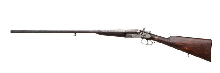 Vintage double-barreled hunting rifle isolated on a white back.
