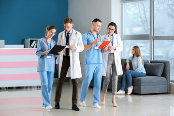 Doctors discussing results of analyses in clinic