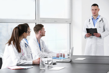 Obraz premium Young interns during lecture in modern clinic