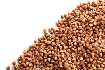 Raw buckwheat on white background