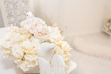 Obraz na płótnie Canvas decorative white doves handmade whith gold rings. Wedding element