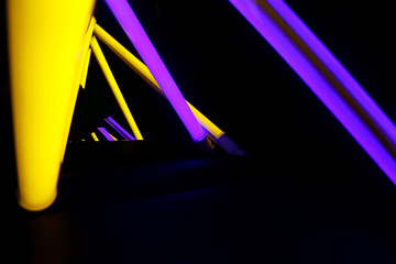 Bright neon lamps on dark background