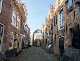 Fototapeta na wymiar Urban old romantic tiny street brings back memories. The Netherlands.