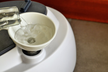 The steam iron boiler is supplied with water