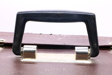 close up old vintage suitcase handle