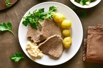 Boiled beef with potatoes and horseradish