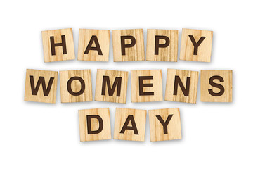 Happy woman's day, the inscription composed of the alphabet on wooden cubes. White background. Isolated. Holiday