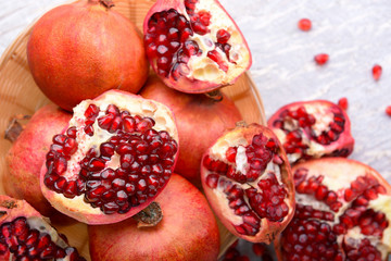 Ripe pomegranates on light background