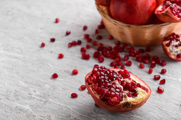 Ripe pomegranates on light background