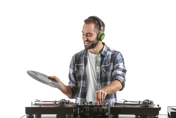 Male DJ playing music on white background