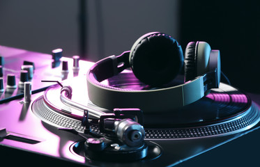 Fototapeta na wymiar Modern DJ mixer in club, closeup