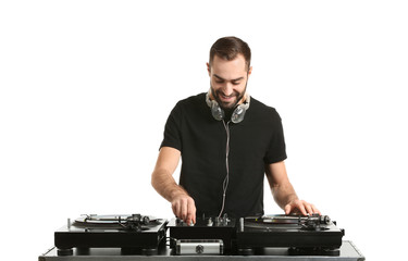 Male DJ playing music on white background